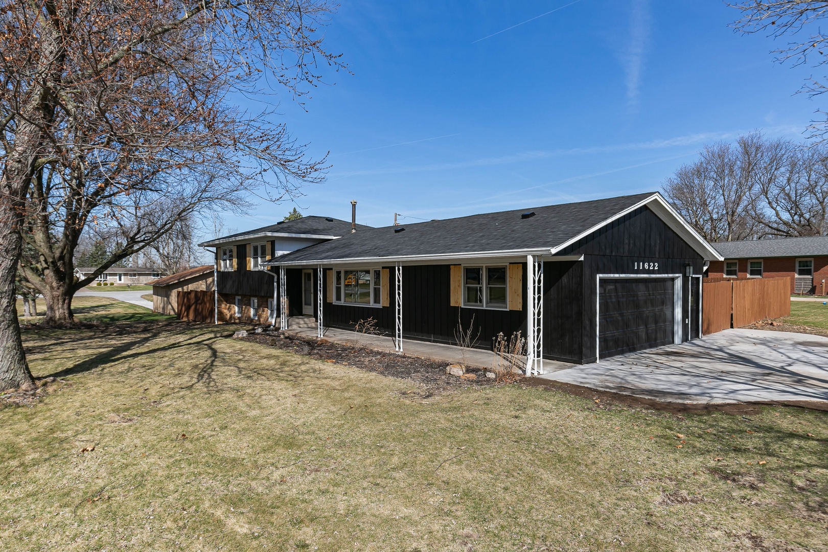 11622 27th Street West Milan, IL 61264 - Photo 3 of 49 front view of a house with a yard