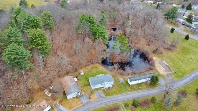 aerial view of a house with outdoor space