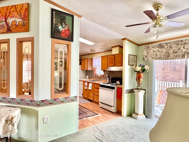 a kitchen with stainless steel appliances granite countertop a stove and a refrigerator