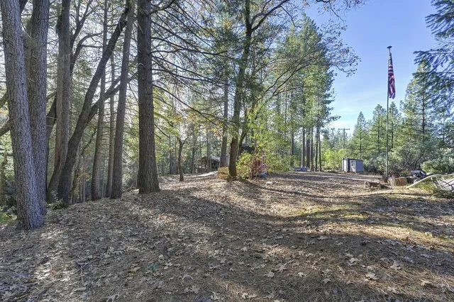 a view of street with a house