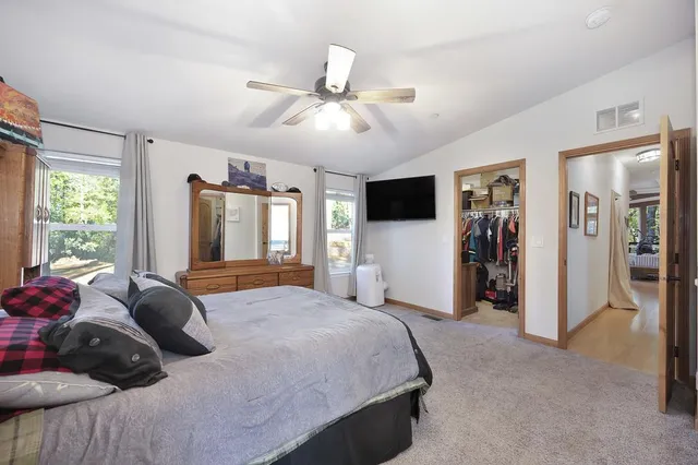 a view of backyard with outdoor seating