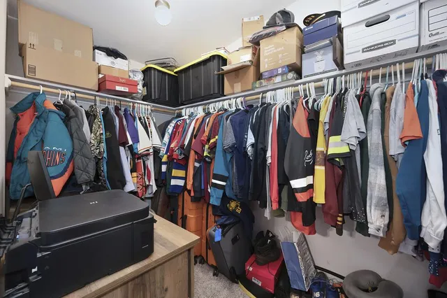 a view of a patio with a dining table and chairs