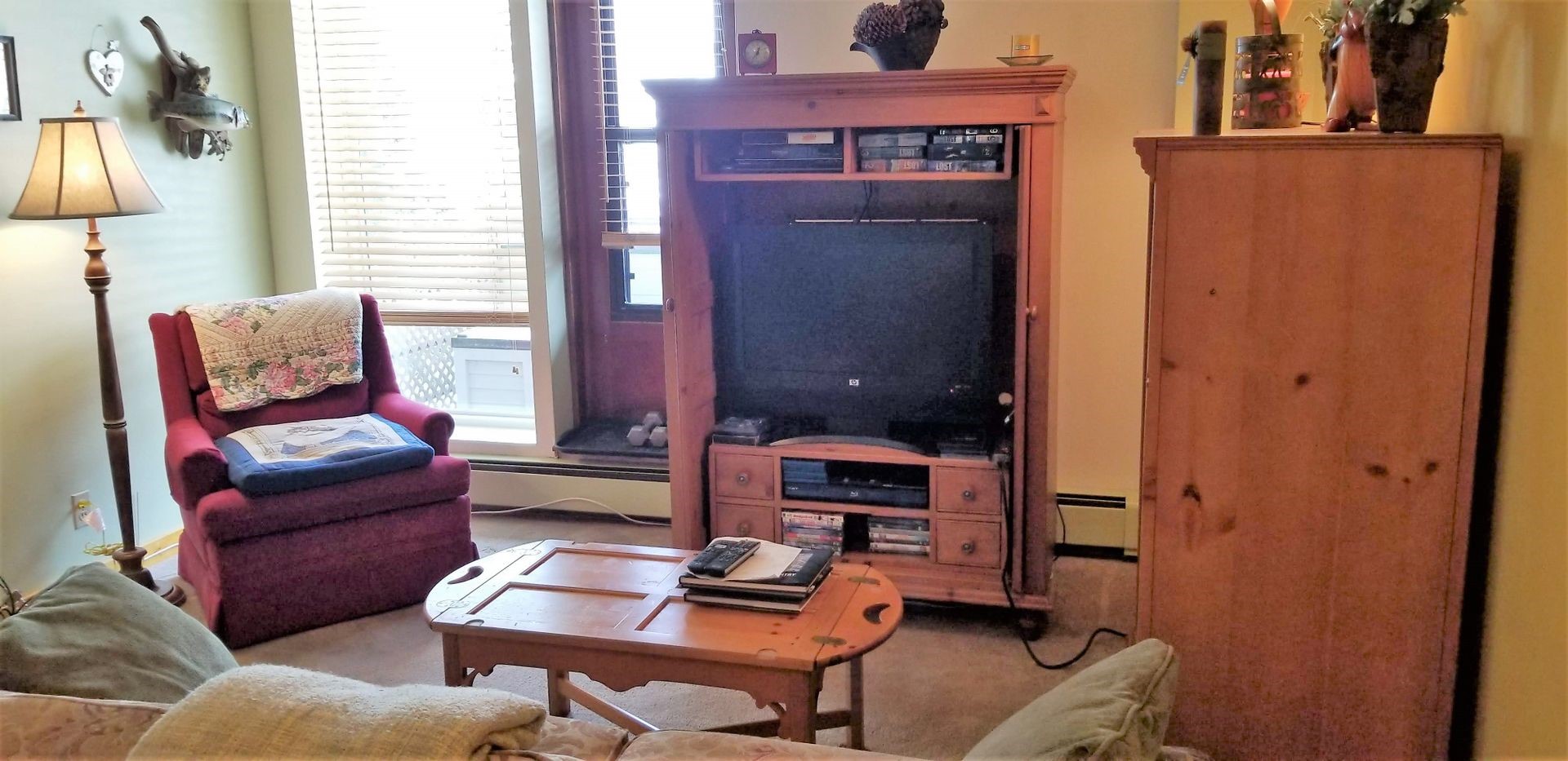 800 Copper Road, Unit 205 Frisco, CO 80443 - Photo 9 of 22 Living room with a baseboard radiator, carpet floors, and a baseboard heating unit