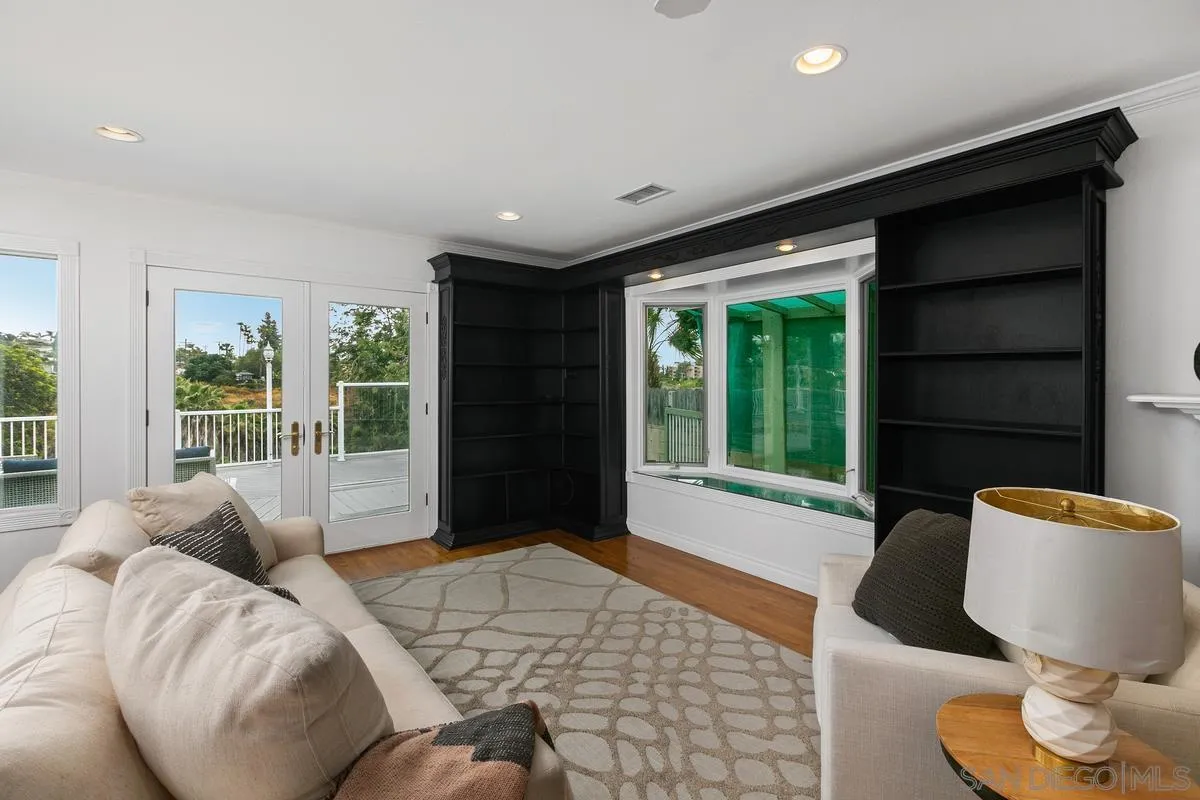 7609 El Paso Street La Mesa, CA 91942 - Photo 11 of 46 a living room with furniture and a large window