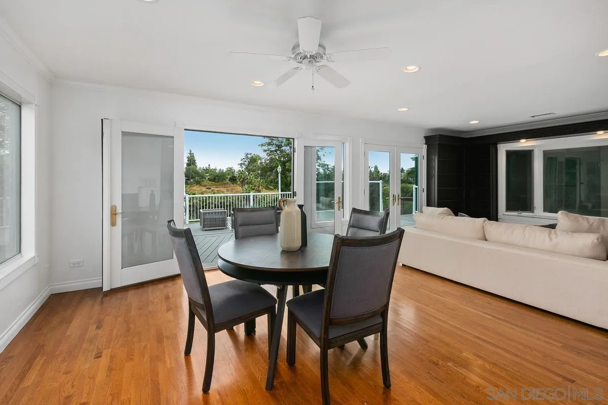 7609 El Paso Street La Mesa, CA 91942 - Photo 13 of 46 a view of a dining room with furniture window and wooden floor