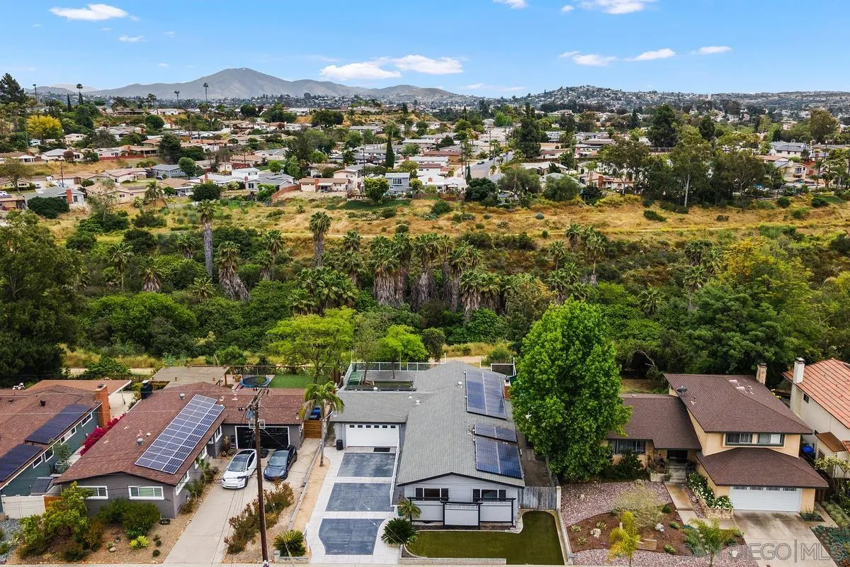 7609 El Paso Street La Mesa, CA 91942 - Photo 36 of 46 an aerial view of residential houses with outdoor space and trees