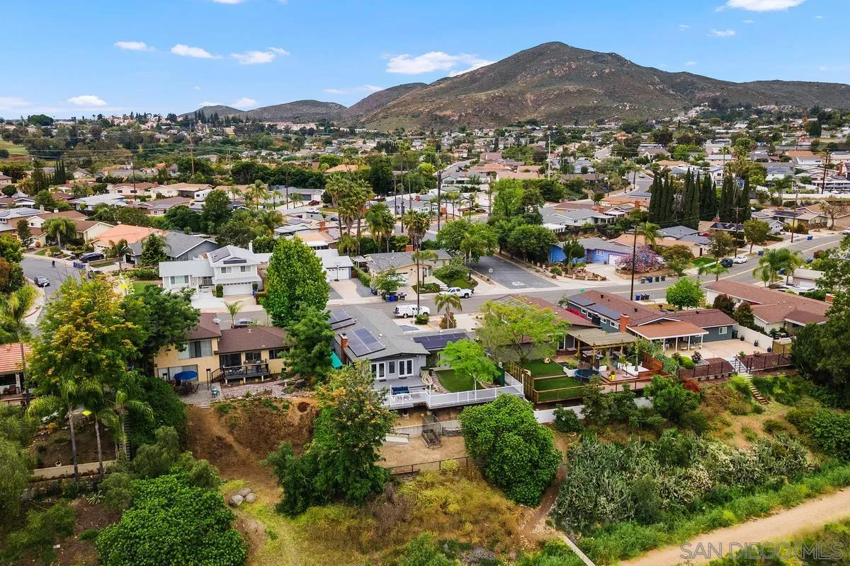 7609 El Paso Street La Mesa, CA 91942 - Photo 42 of 46 an aerial view of residential houses with outdoor space and trees