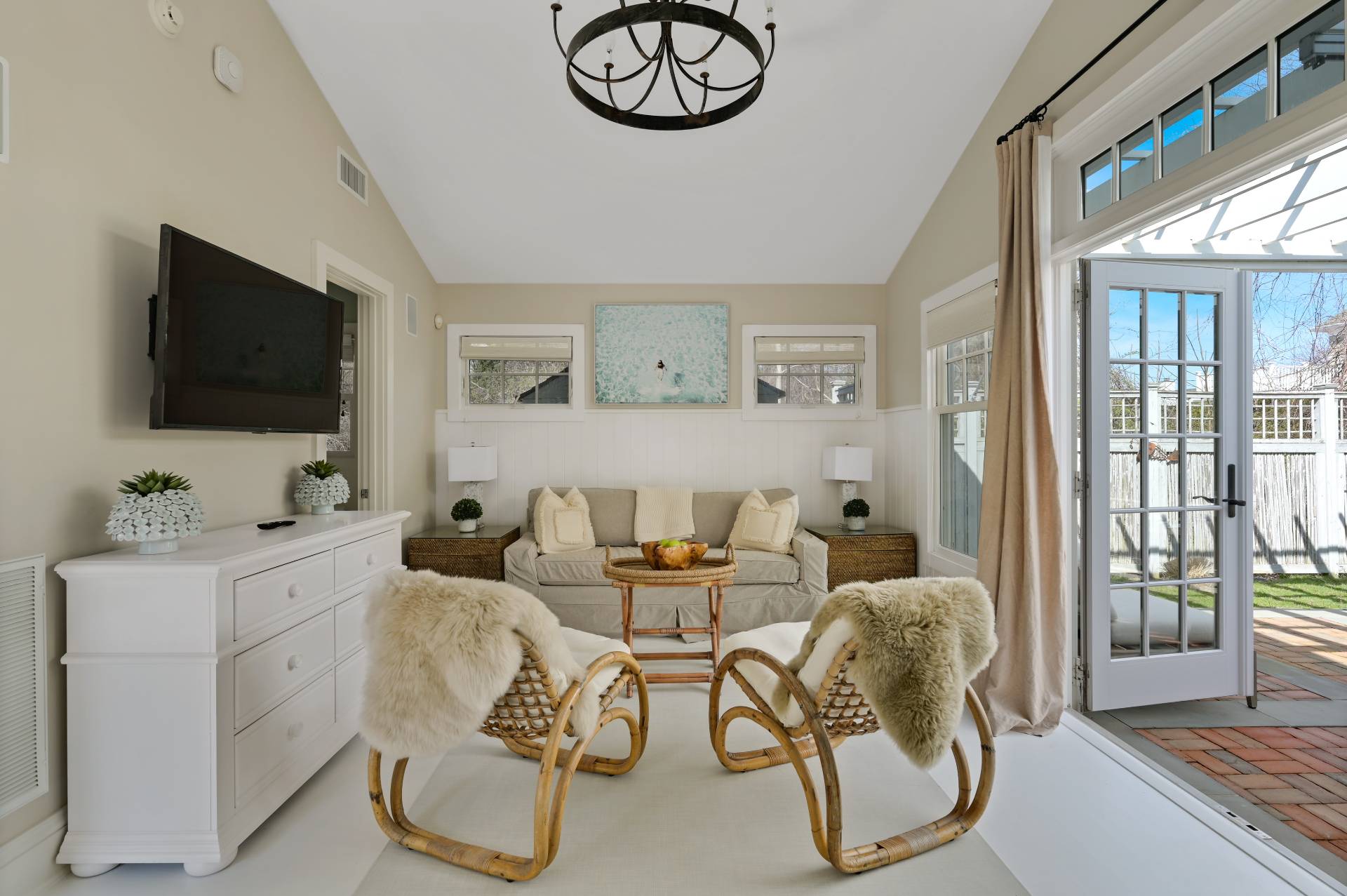 5 Ridge Drive Sag Harbor, NY 11963 - Photo 23 of 27 a living room with furniture and a flat screen tv
