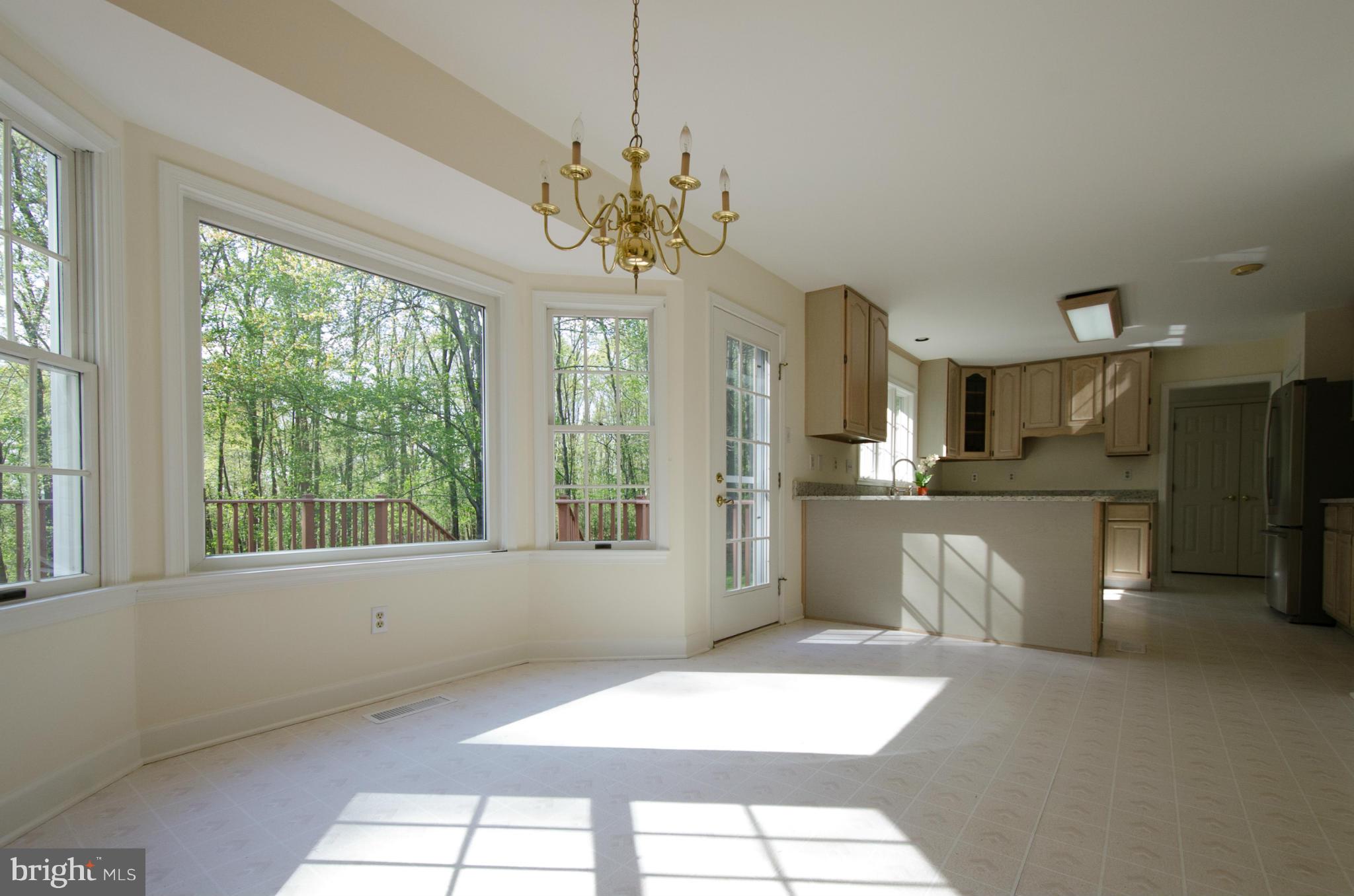 17610 Backbone Road Parkton, MD 21120 - Photo 11 of 30 Breakfast Room w/bay window & door to deck