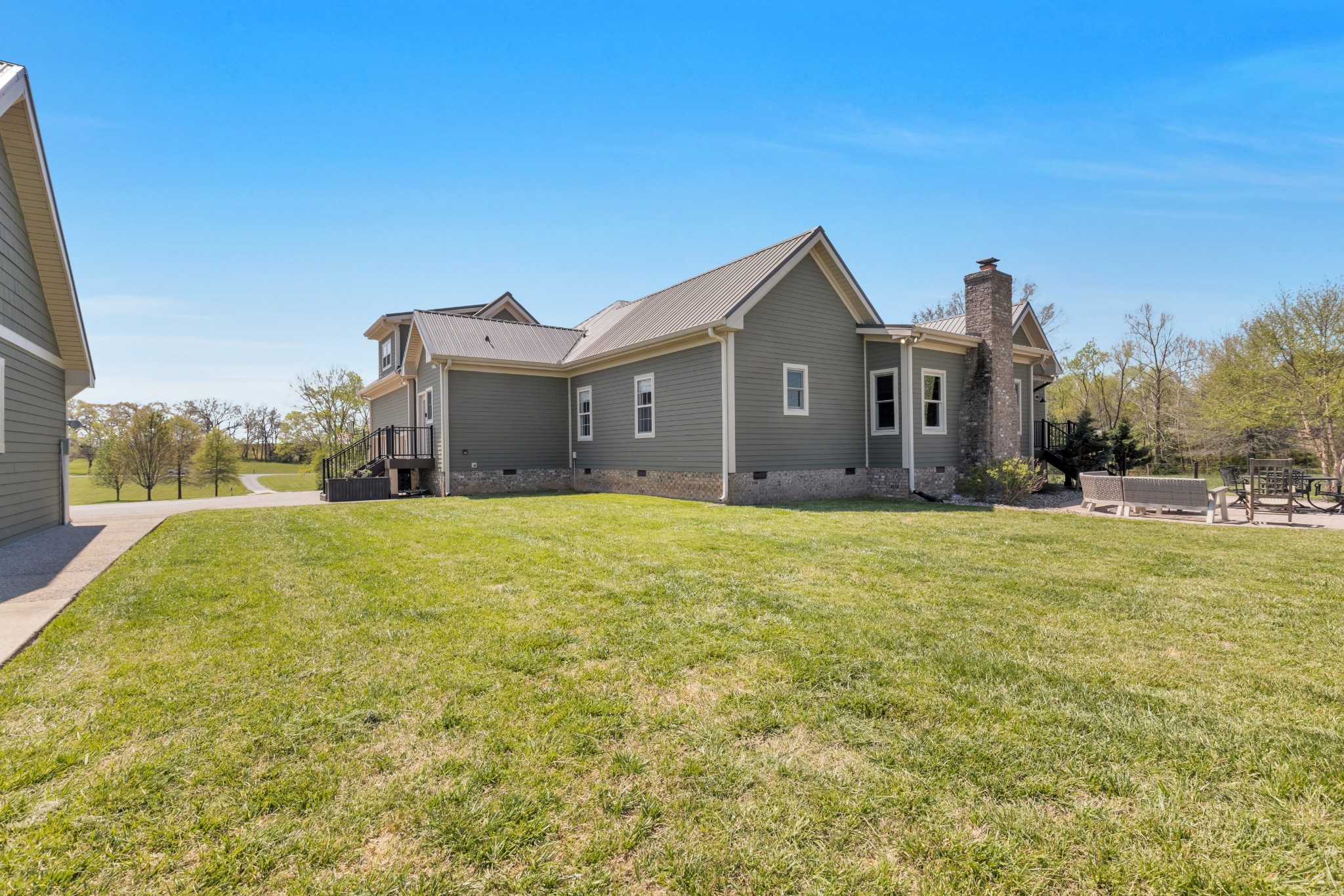 3988 Fykes Grove Road Cedar Hill, TN 37032 - Photo 42 of 50 a front view of a house with a yard