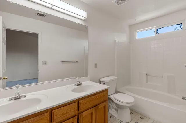 a front view of a house with a garage