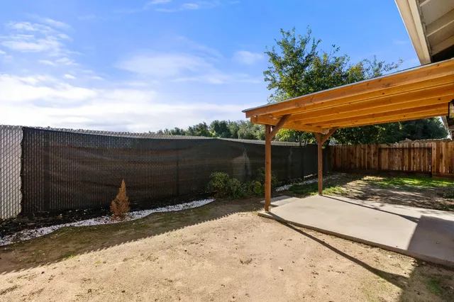 a view of a house with a patio