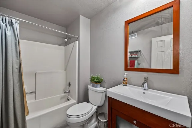 a view of backyard with garage