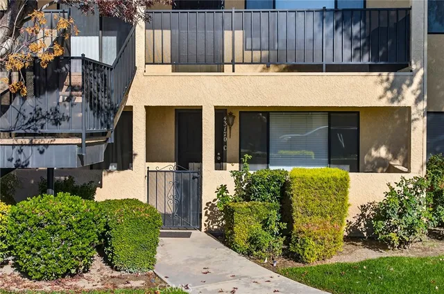 a view of a swimming pool with a lounge chair