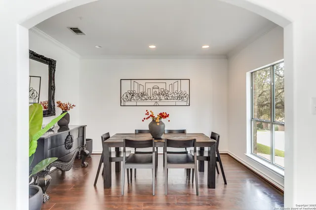 a view of a livingroom with furniture and wooden floor