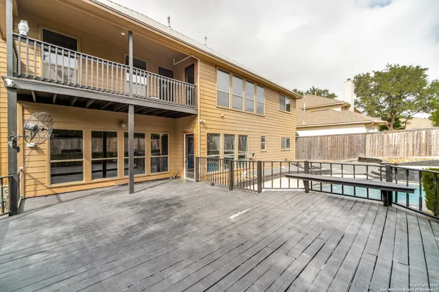 a view of a house with swimming pool