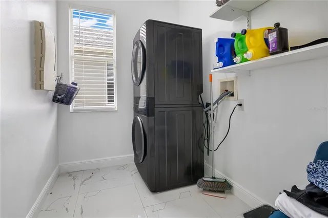 a view of a storage & utility room with washer and dryer