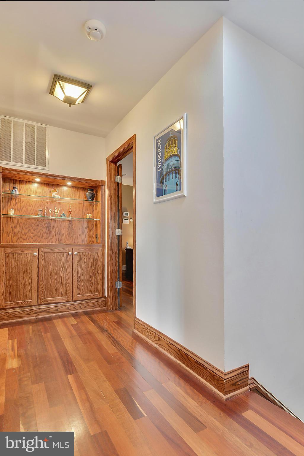 11605 Deer Forest Road Reston, VA 20194 - Photo 12 of 30 Built in shelving and storage in Upper Hall