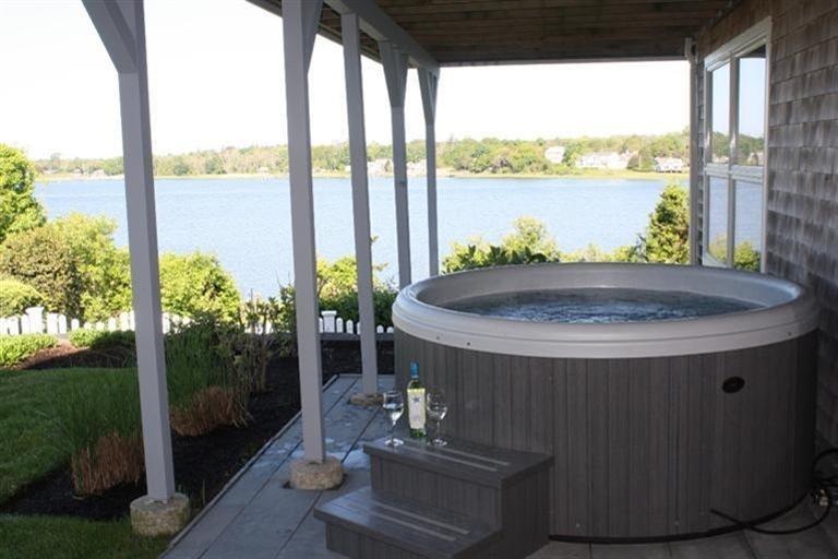70 Gibson Road Orleans, MA 02653 - Photo 15 of 35 a table with lake view