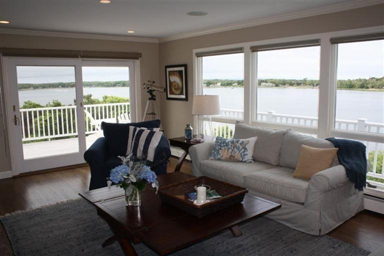 70 Gibson Road Orleans, MA 02653 - Photo 9 of 35 a living room with furniture and a large window