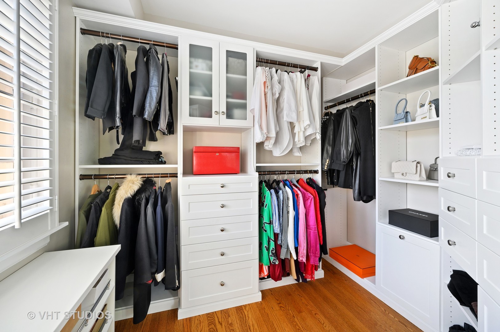 92 Robsart Road Kenilworth, IL 60043 - Photo 27 of 54 a view of walk in closet with clothes and shoes