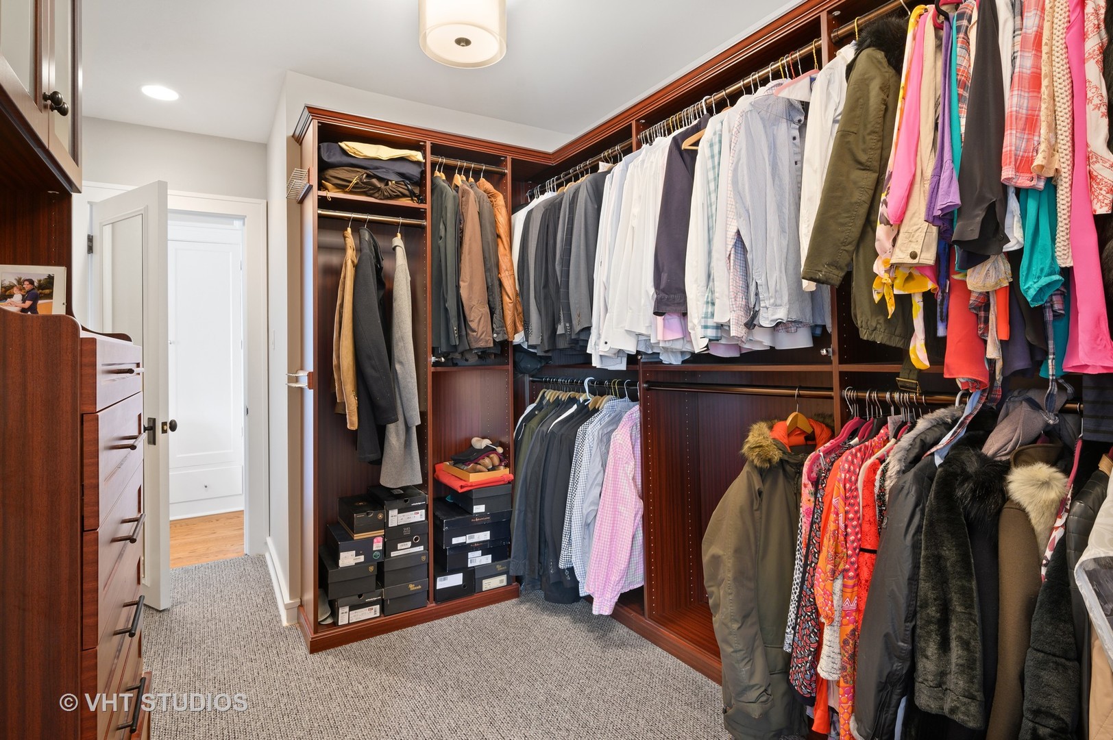 92 Robsart Road Kenilworth, IL 60043 - Photo 28 of 54 a view of walk in closet with clothes and shoes