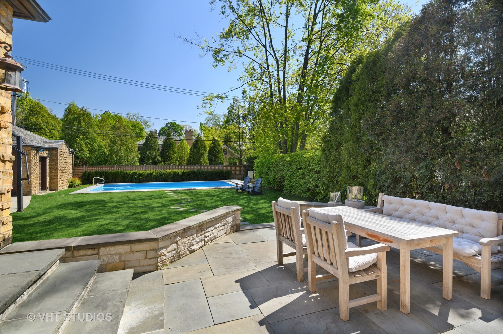 92 Robsart Road Kenilworth, IL 60043 - Photo 44 of 54 a view of a chairs and table in backyard yard