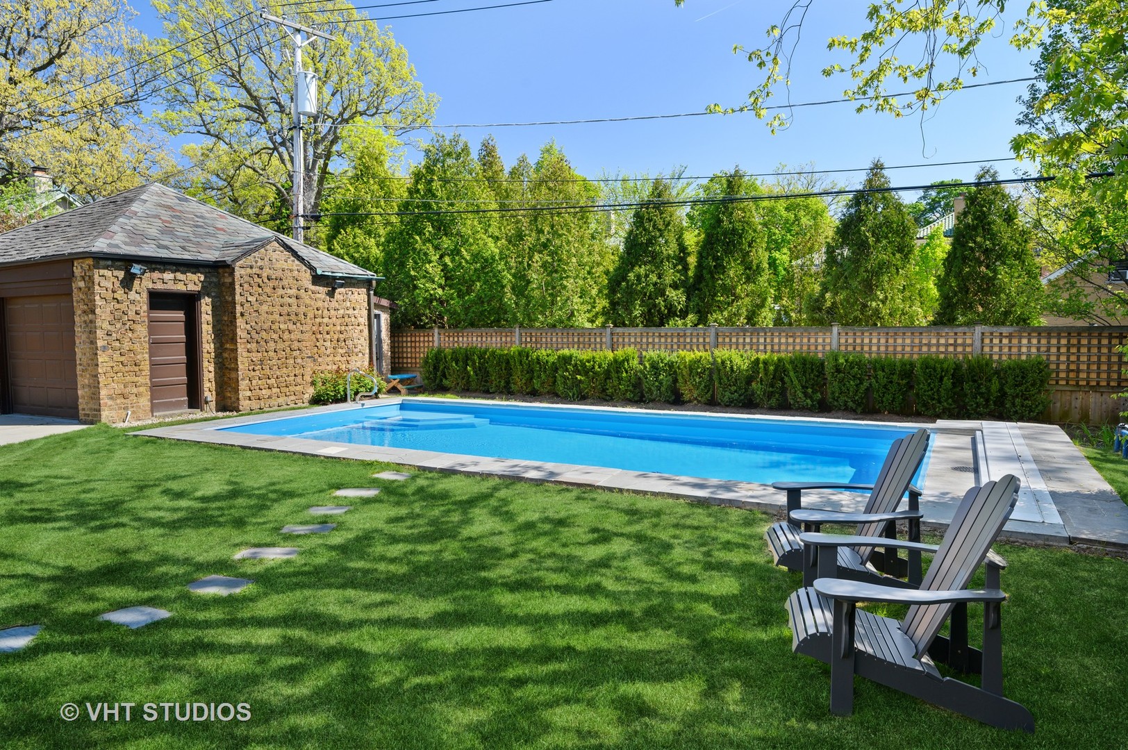 92 Robsart Road Kenilworth, IL 60043 - Photo 46 of 54 a view of a chair and table in the garden