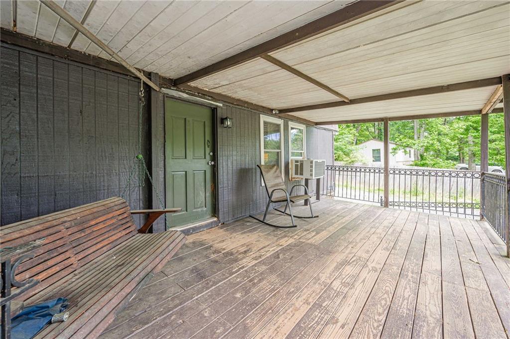 90 Valley Trail Southeast Acworth, GA 30101 - Photo 3 of 28 a view of outdoor space with wooden floor and iron stairs