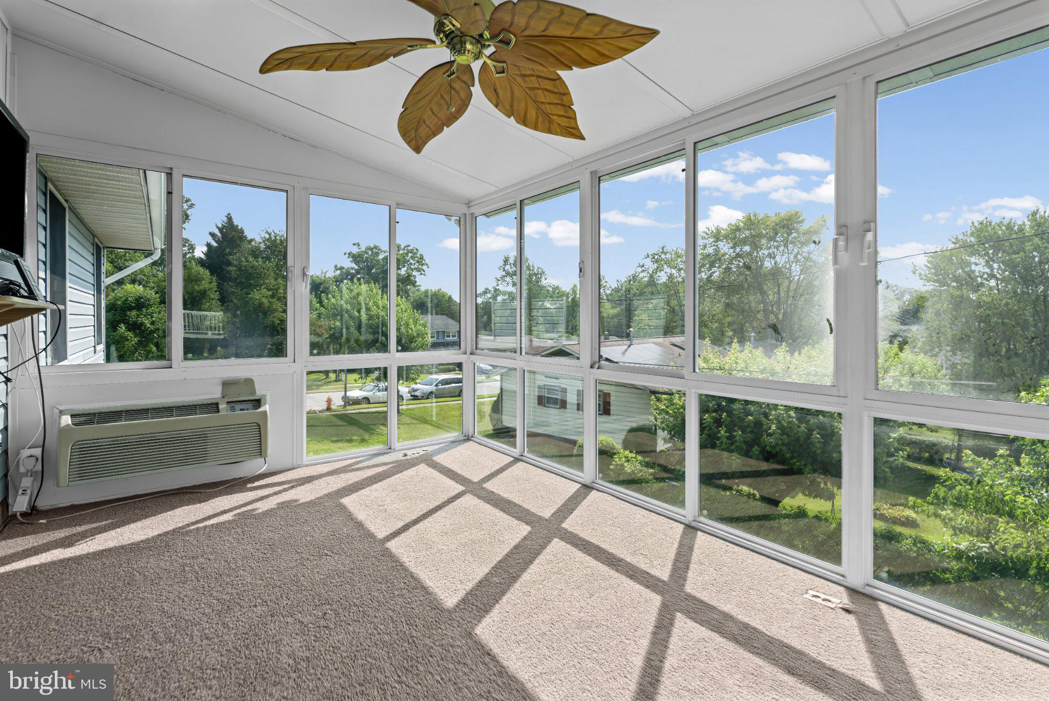 1317 Roxboro Road Baltimore, MD 21237 - Photo 11 of 30 Sunlit serenity in a screened porch.