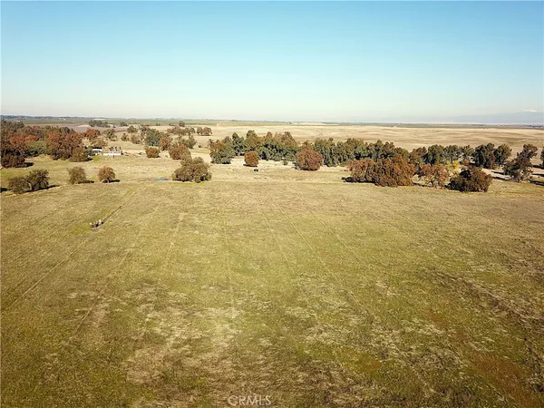 an aerial view of residential building and ocean