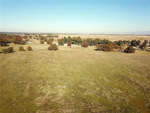 an aerial view of residential building and ocean