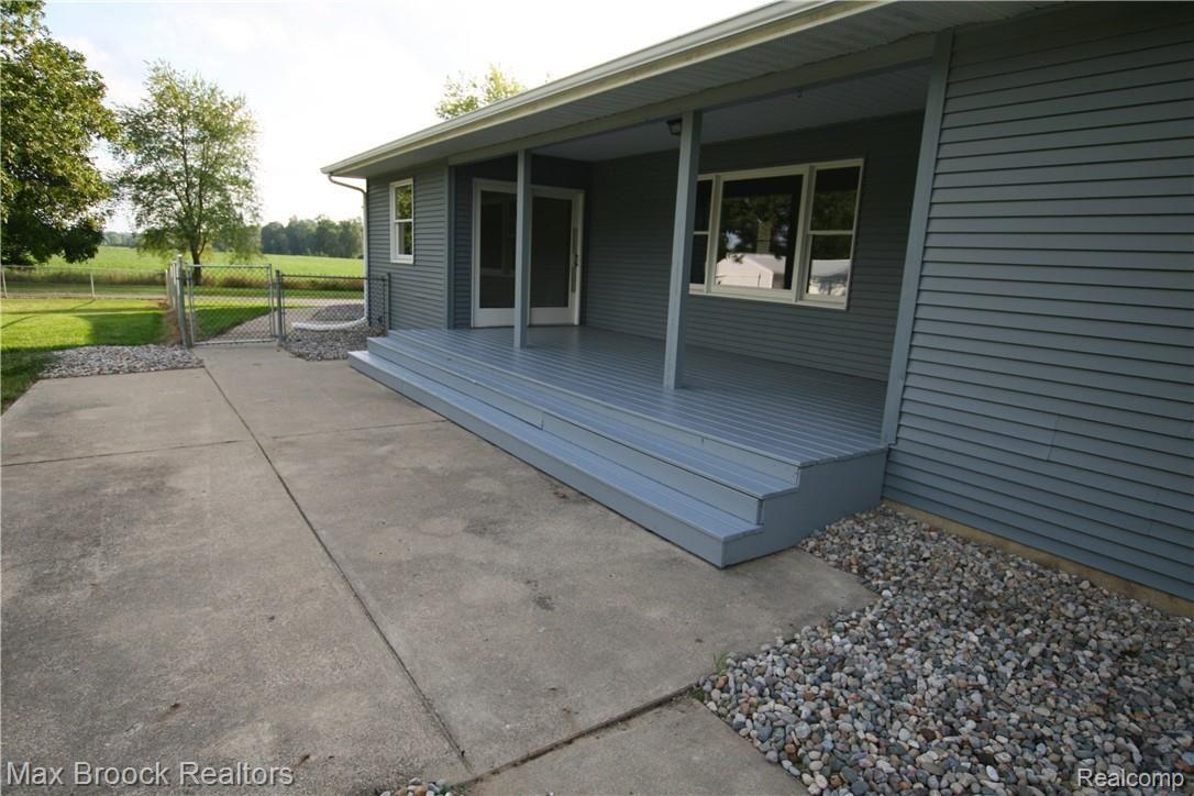 4515 Shepper Road Stockbridge, MI 49285 - Photo 28 of 34 Back Deck and Patio