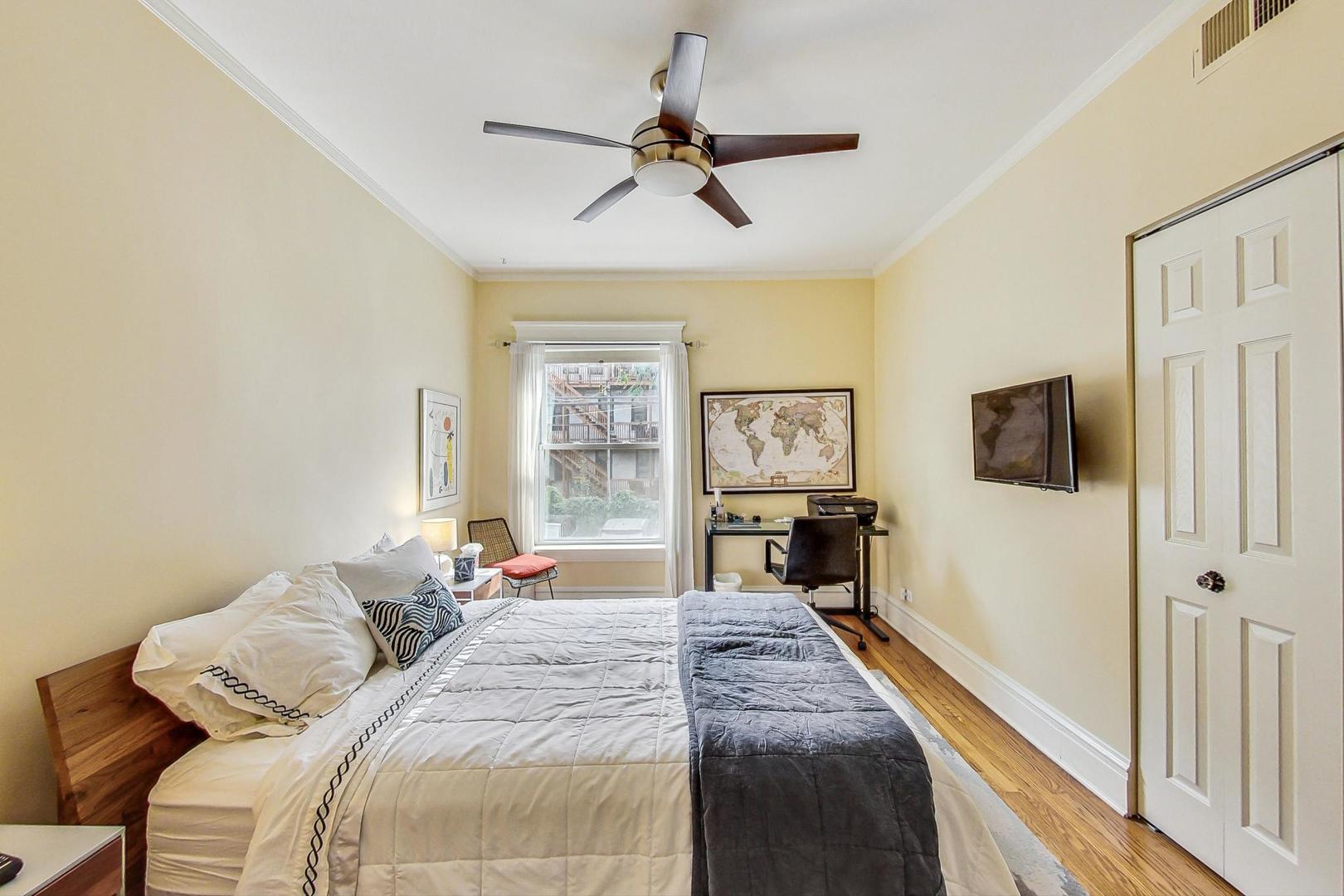 733 West Buckingham Place, Unit 13 Chicago, IL 60657 - Photo 13 of 28 a bedroom with a bed and a window