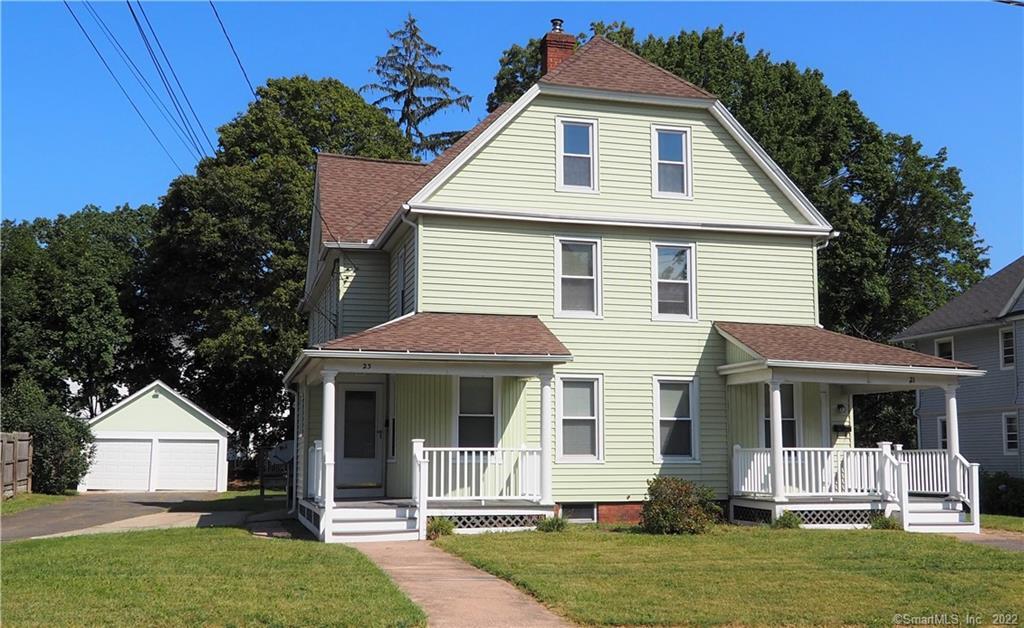21 Ridge Street Manchester, CT 06040 - Photo 1 of 1 a front view of a house with a yard