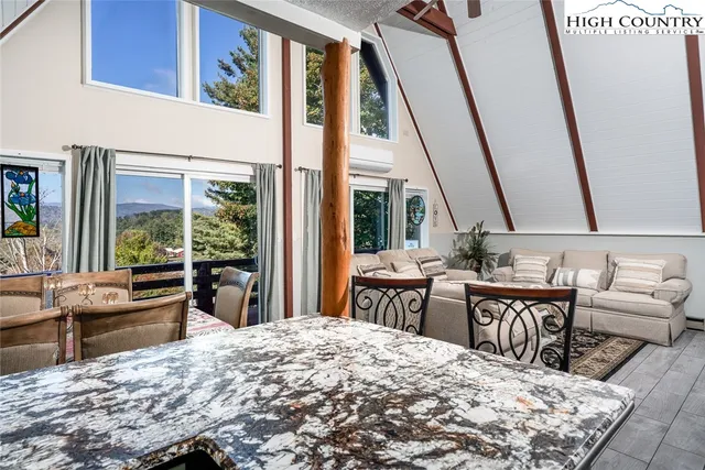 a very nice looking living room with a large window