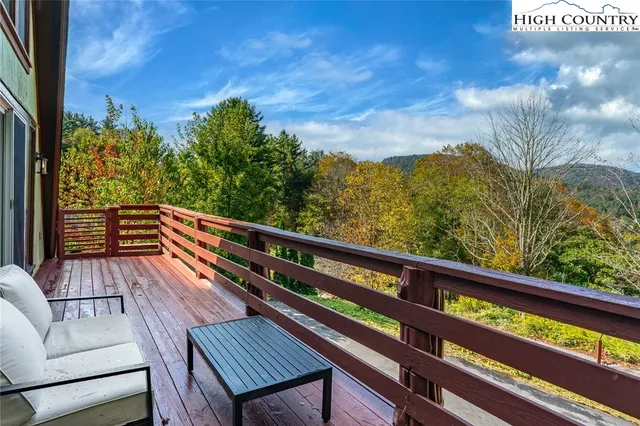 a view of balcony with furniture