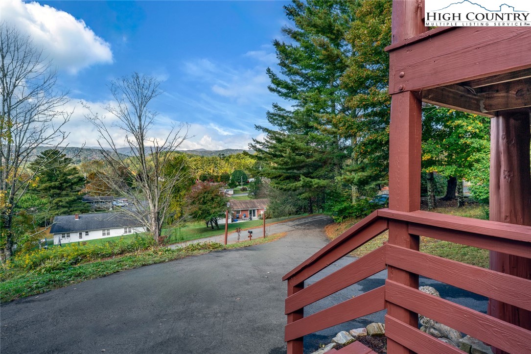 209 Apache Street Newland, NC 28657 - Photo 8 of 42 a view of a bench in a yard