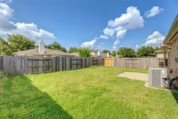 a view of a backyard with a garden