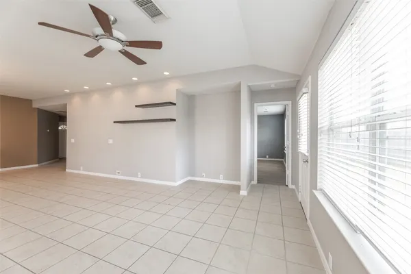 a view of an empty room and window