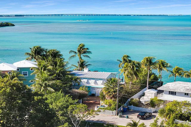 a view of a lake with a big yard