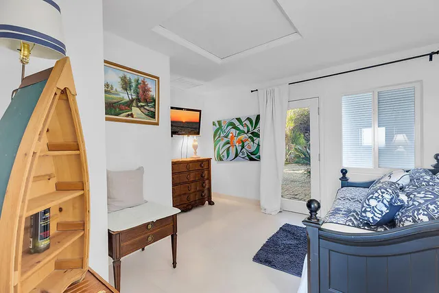 a living room with furniture and a couch