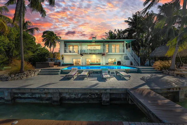 a view of a house with swimming pool