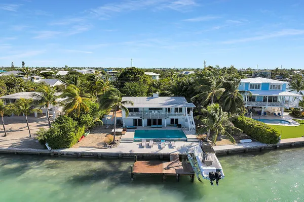 a view of a balcony with furniture