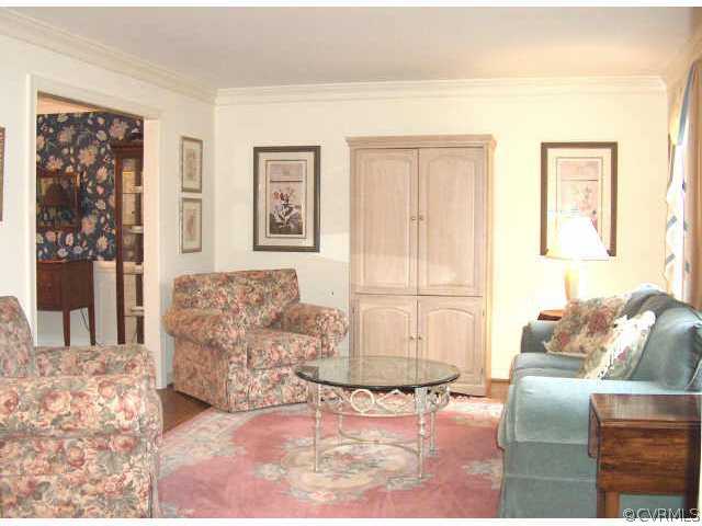 2721 Cassaway Road Midlothian, VA 23113 - Photo 4 of 10 a living room with furniture and a couch