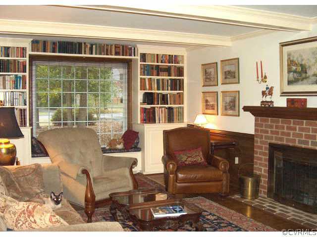 2721 Cassaway Road Midlothian, VA 23113 - Photo 5 of 10 a living room with furniture and a fireplace