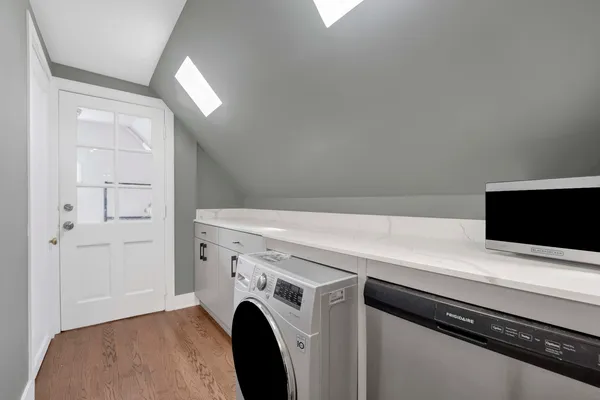 a utility room with dryer and washer