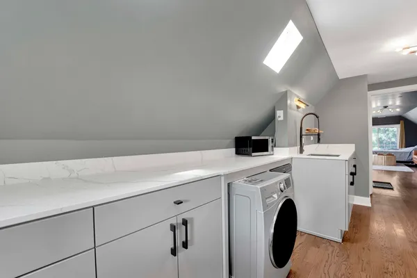a utility room with dryer and washer
