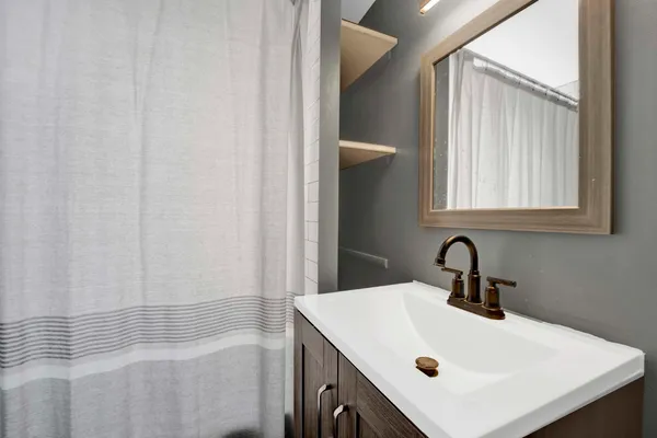 a bathroom with a sink and a bathtub