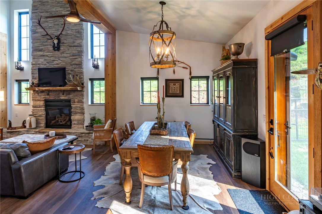 509 Grant Houck Road Todd, NC 28684 - Photo 24 of 43 a dining room with furniture window wooden floor
